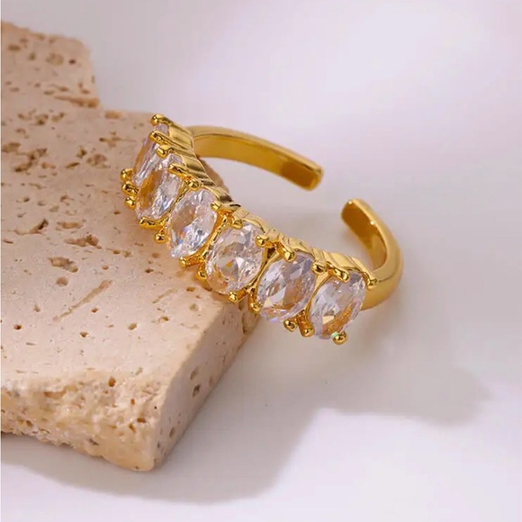 Jewelry - Gold Open Band Ring with Clear Oval Inset Accents